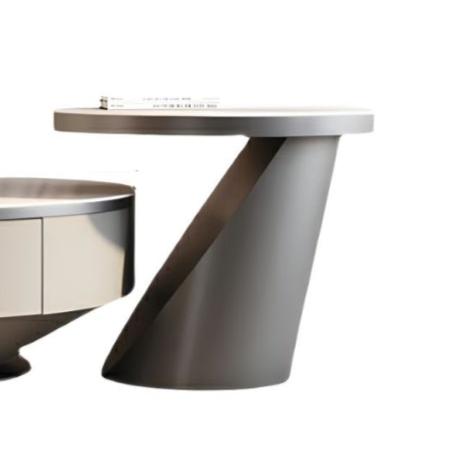 A sleek circular coffee table in Aspen Grey, perfect for modern interiors.