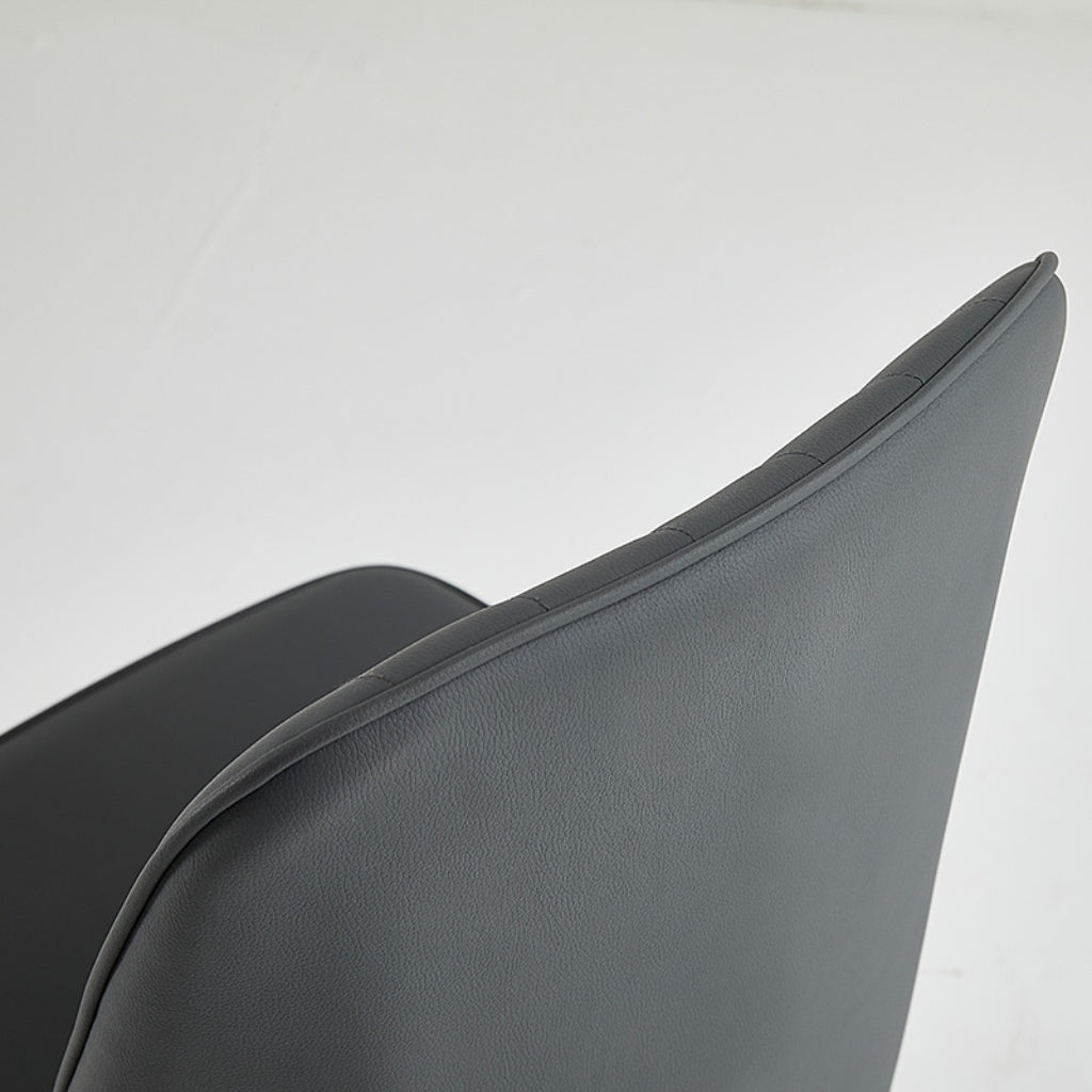 Athlena dining chair seat pu fabric close up.