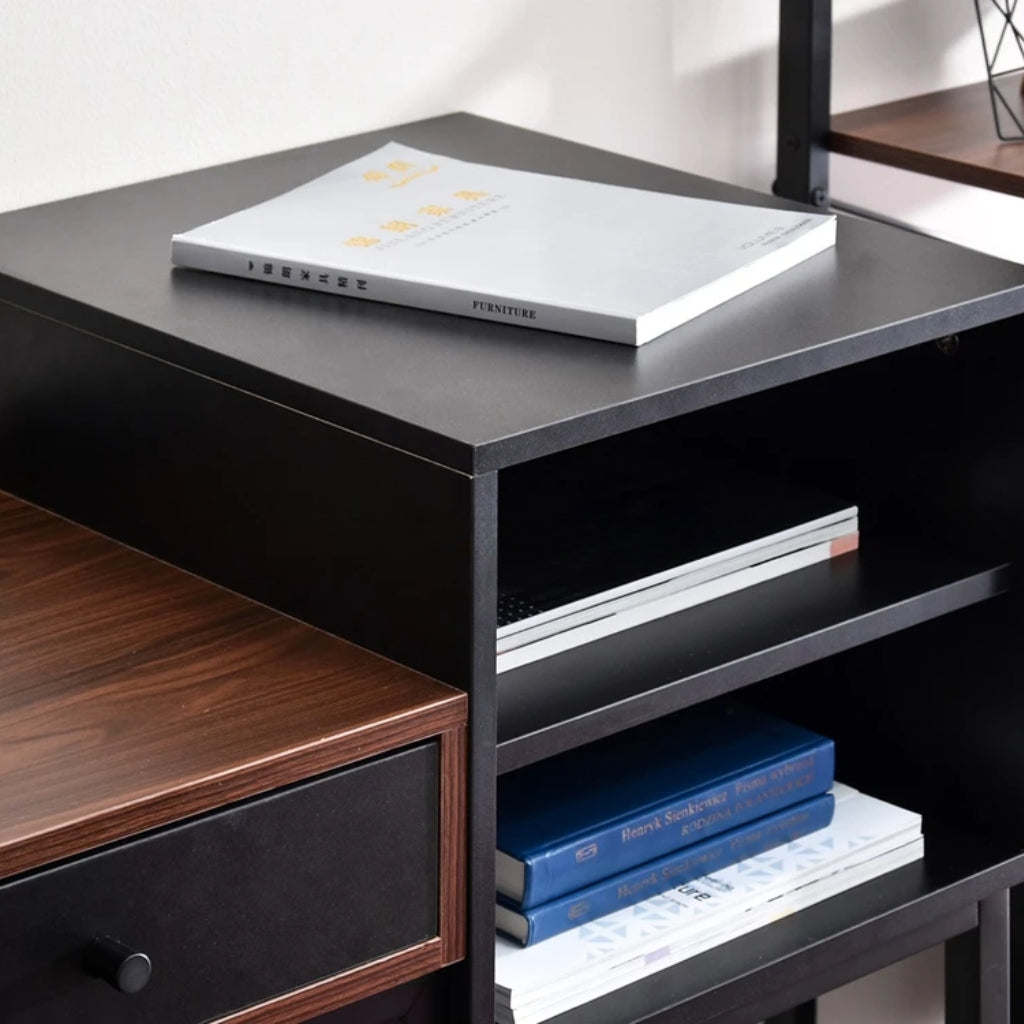 Black and brown Bloomsbury Writing Desk in a workspace storage box close up with books inside.