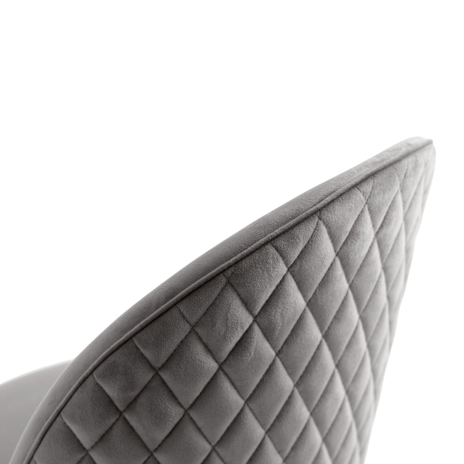 Closeup of a grey quilted seat on a willa arlo dining chair with a diamond stitch back.