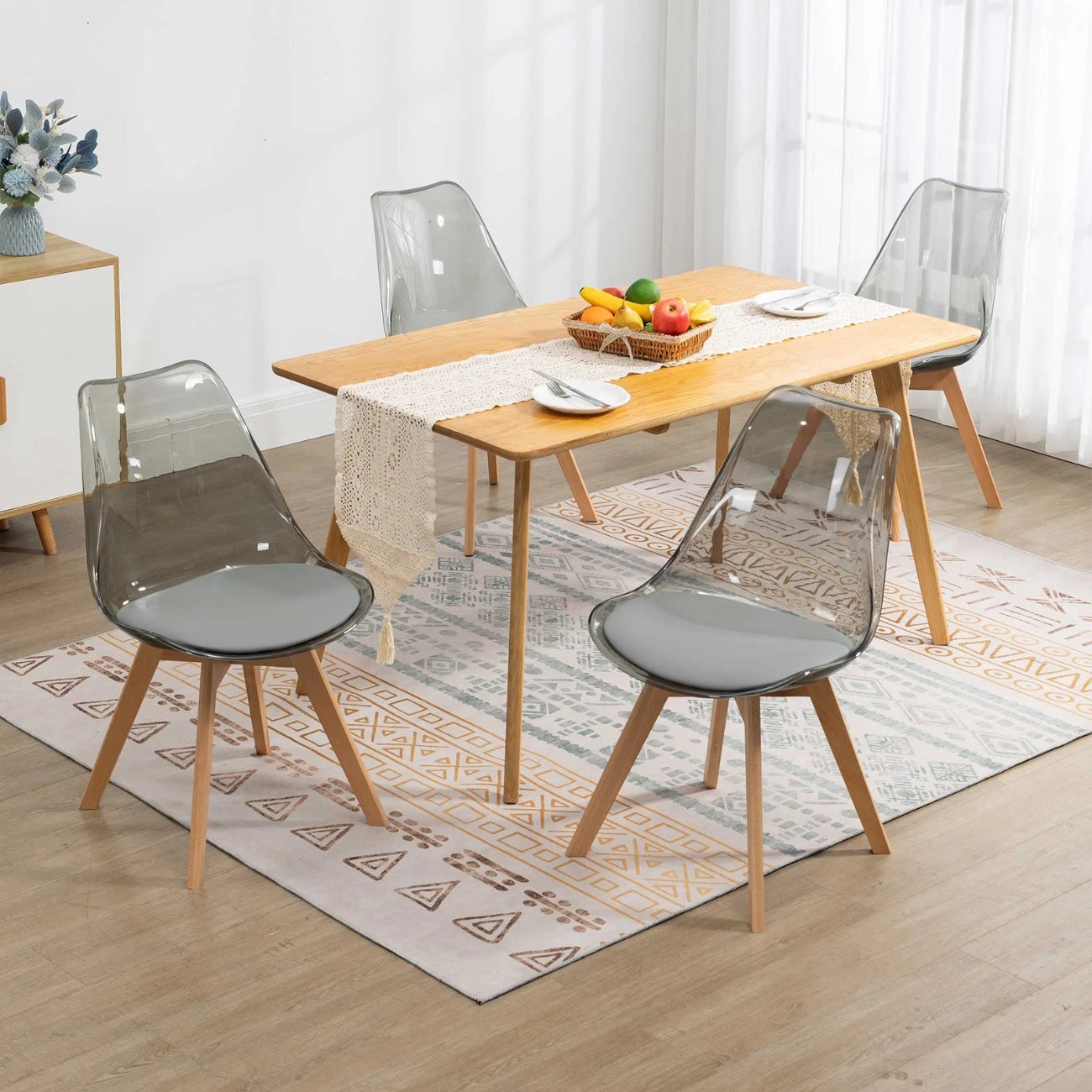 replica tulip chair transparent top and front view in a living room