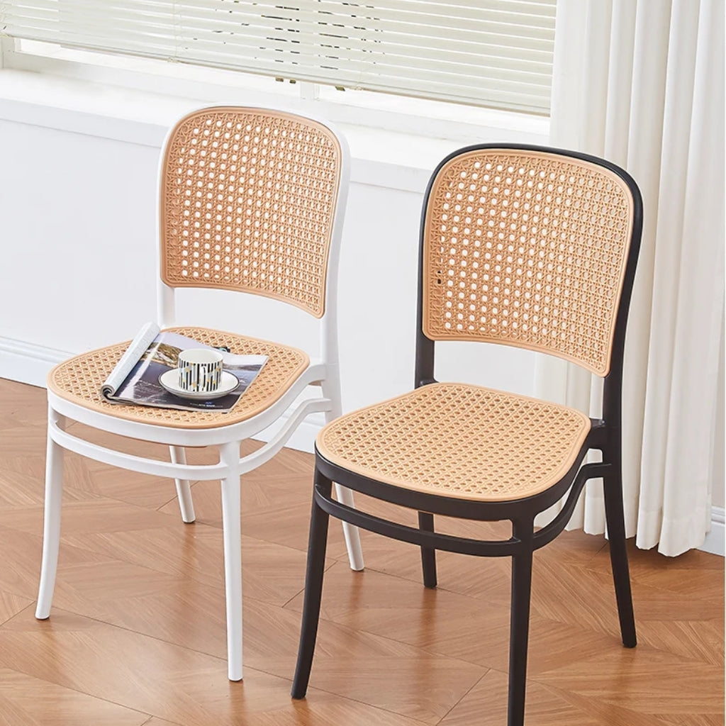 villa nova rattan chair black and white side by side.