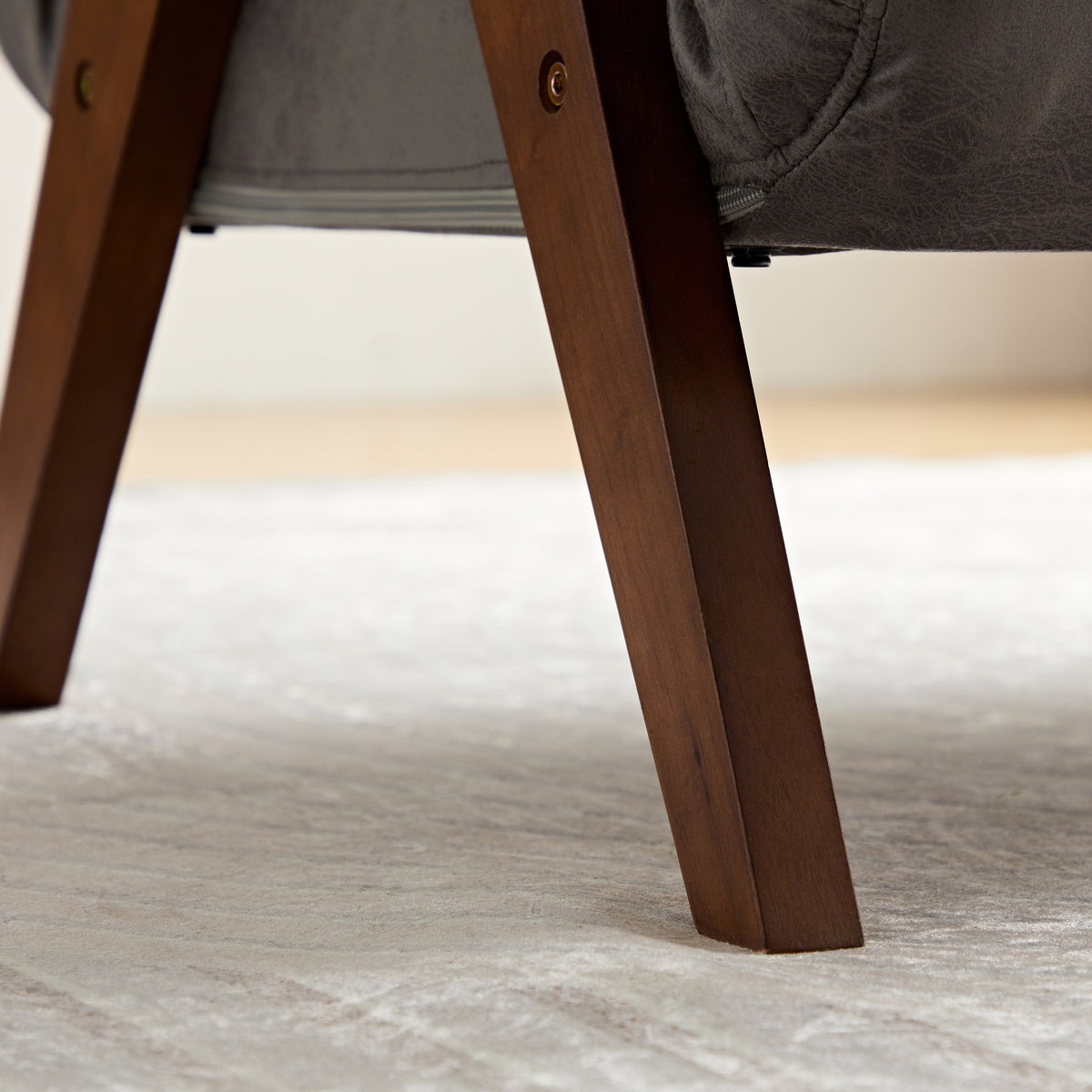  A detailed view of a chair with wooden legs - Ariton Tri-Fold Sleeper Convertible Chair with Pillow, Solid Wood.