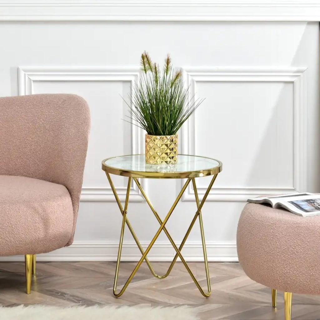 Aden Gold End Table: A stylish gold and black side table with a glass top.