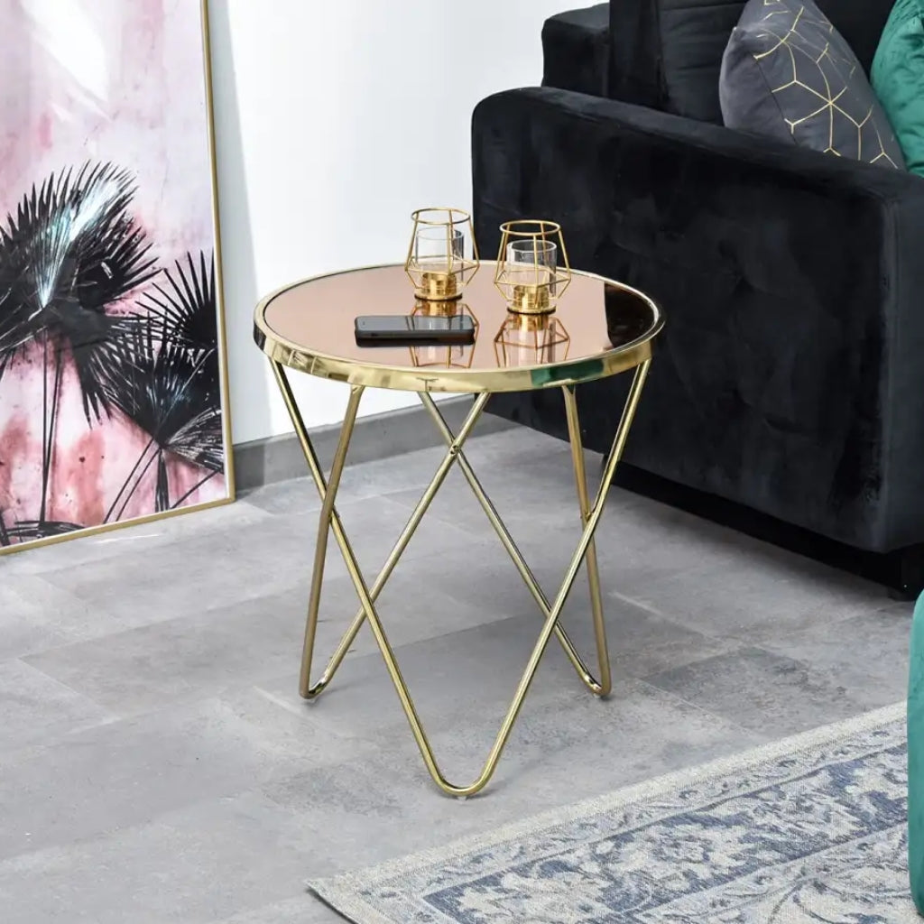 Aden Gold End Table: A stylish gold and black side table with a glass top.