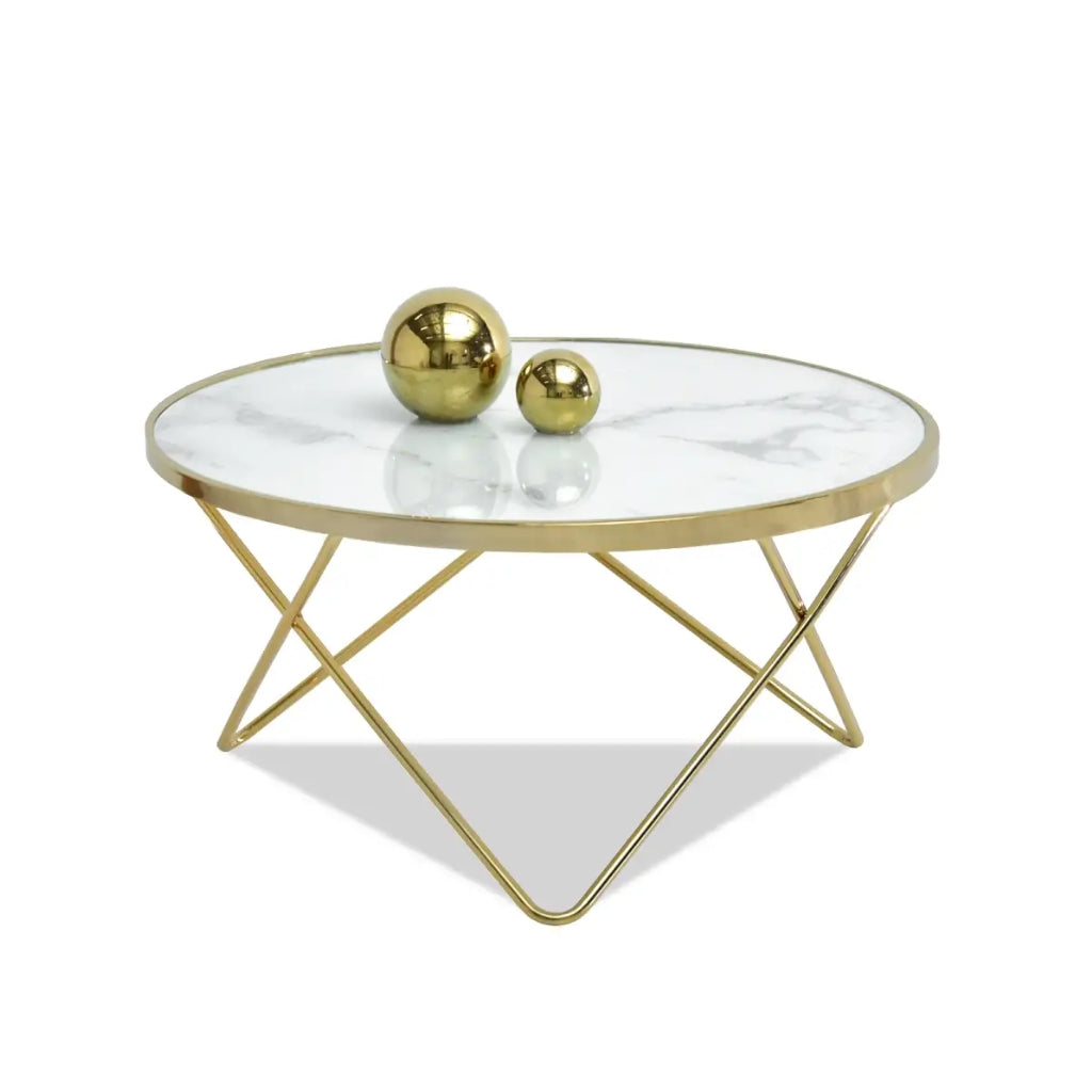 Aden white marble coffee table with elegant gold metal legs.