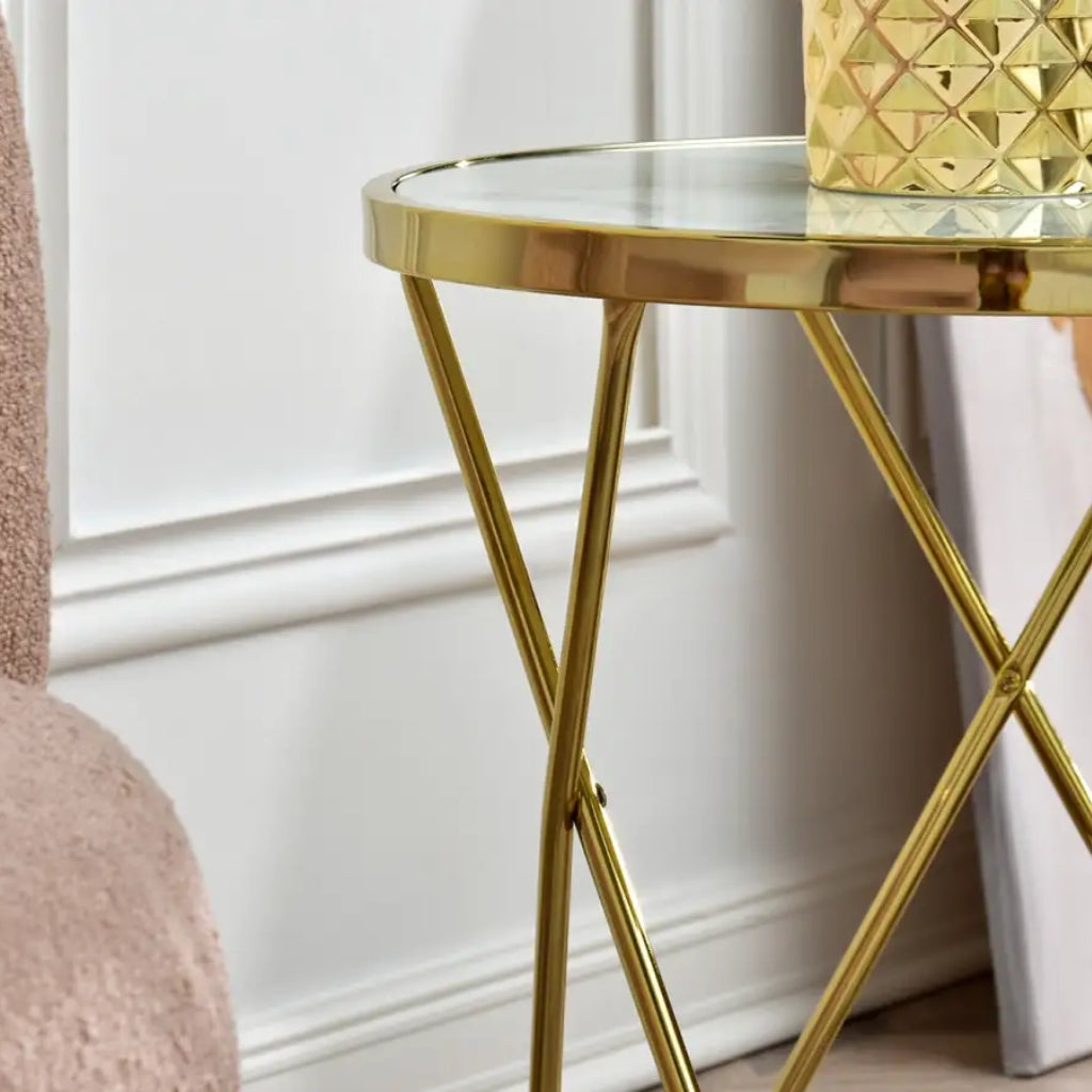 Aden White top and Gold End Table with a gold vase.