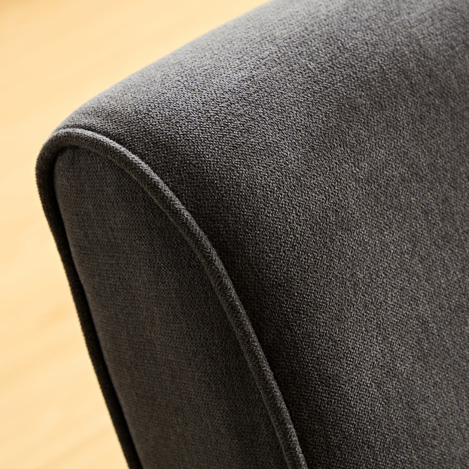 alona rocking arm chair dark grey fabric close up