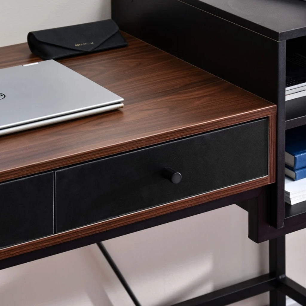 Black and brown Bloomsbury Writing Desk in a workspace drawer close up.