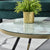 Contemporary Estella white coffee table showcasing a marble top and elegant gold legs, a chic centerpiece for your home.