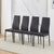 East Urban stylish black four black pu dining chairs in a room.