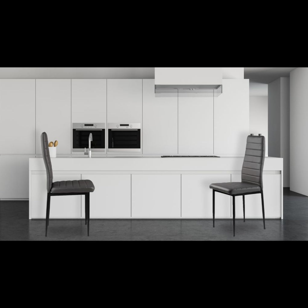 East Urban stylish dark grey pu chairs in a modern kitchen with white cabinets.