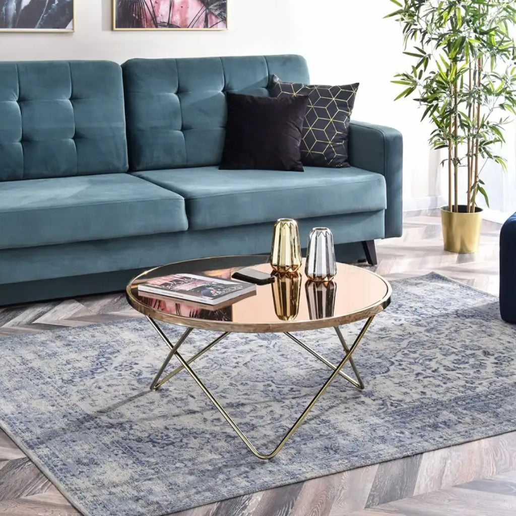 Enhance your space with the Aden mirror glass coffee table, showcasing a stunning gold coffee table with a durable metal frame.