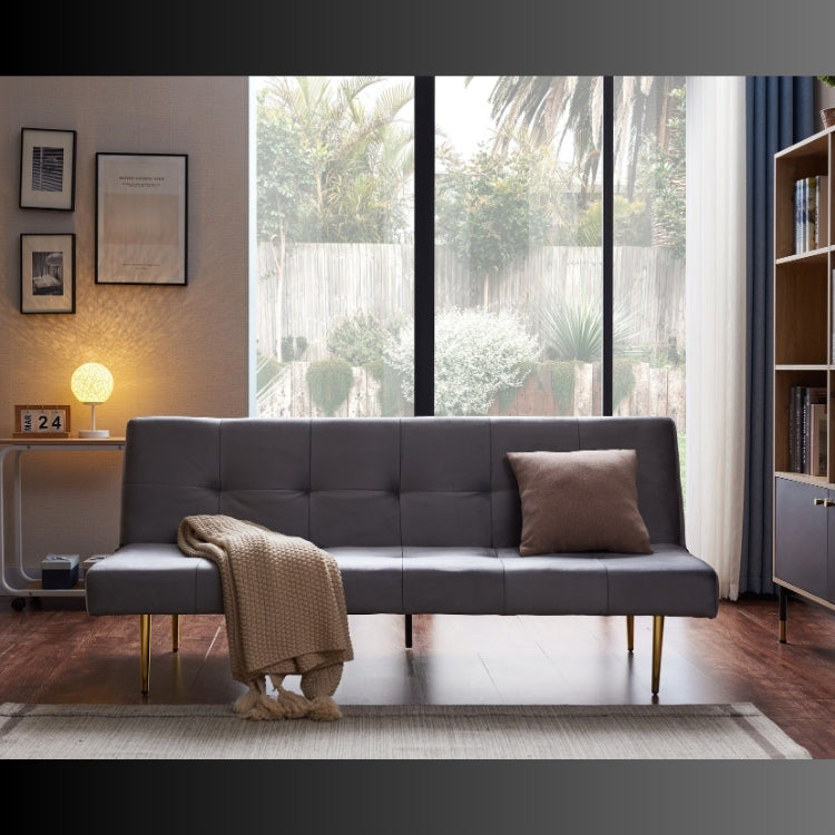 estelle sleeper sofa set in a study with pillows and a blanket on it