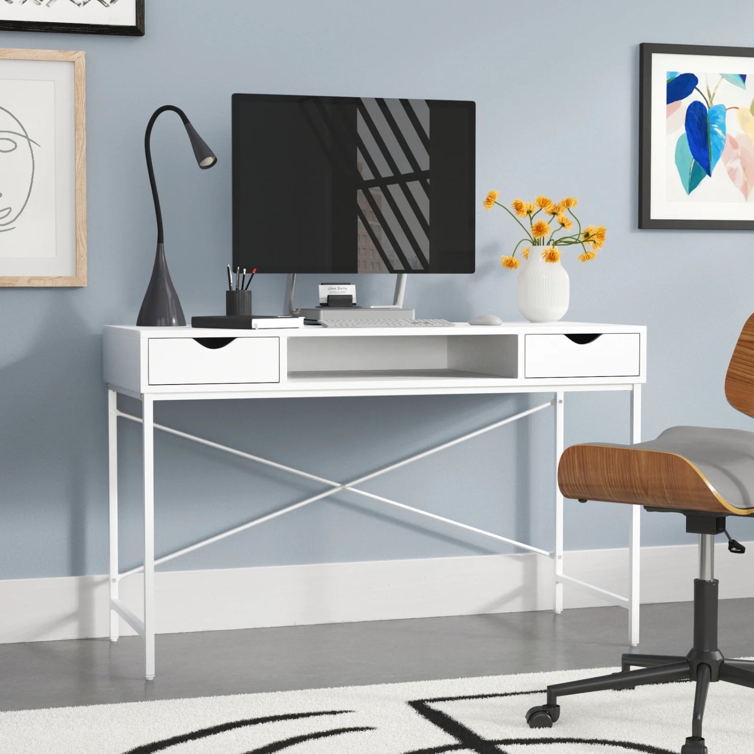 kiana writing desk with a computer and chair creating a productive workspace