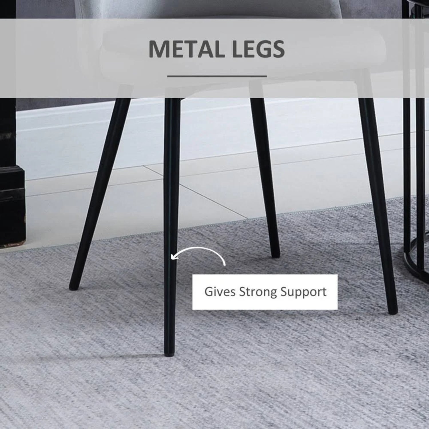 Metal legs provide sturdy support for the black willa arlo dining chair.