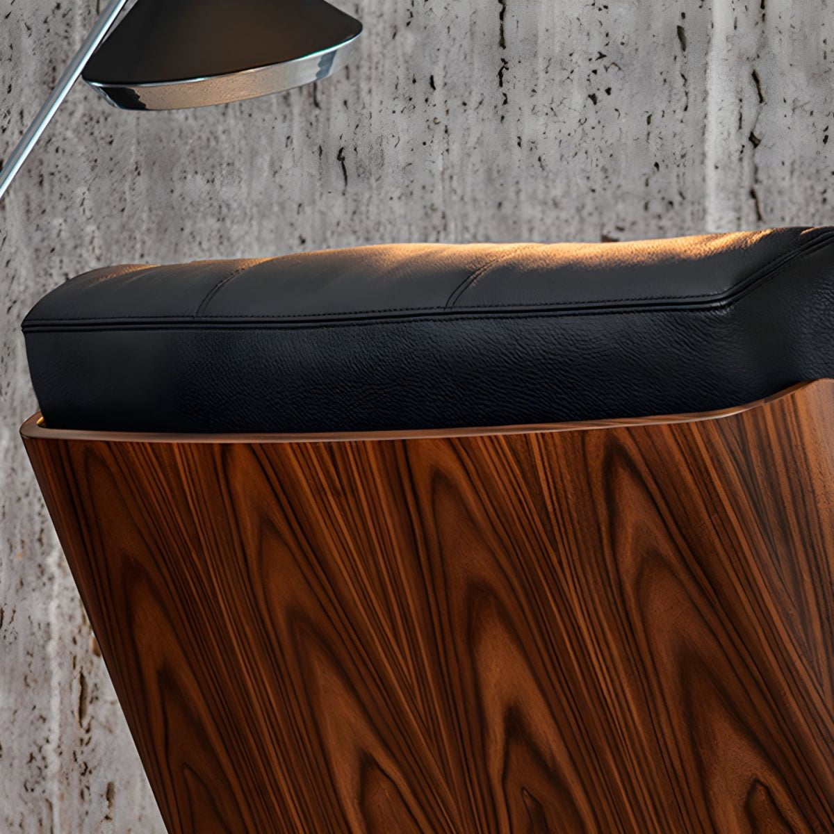 Replica Daiki black leather lounge armchair featuring a wooden back, adding a touch of modern sophistication.