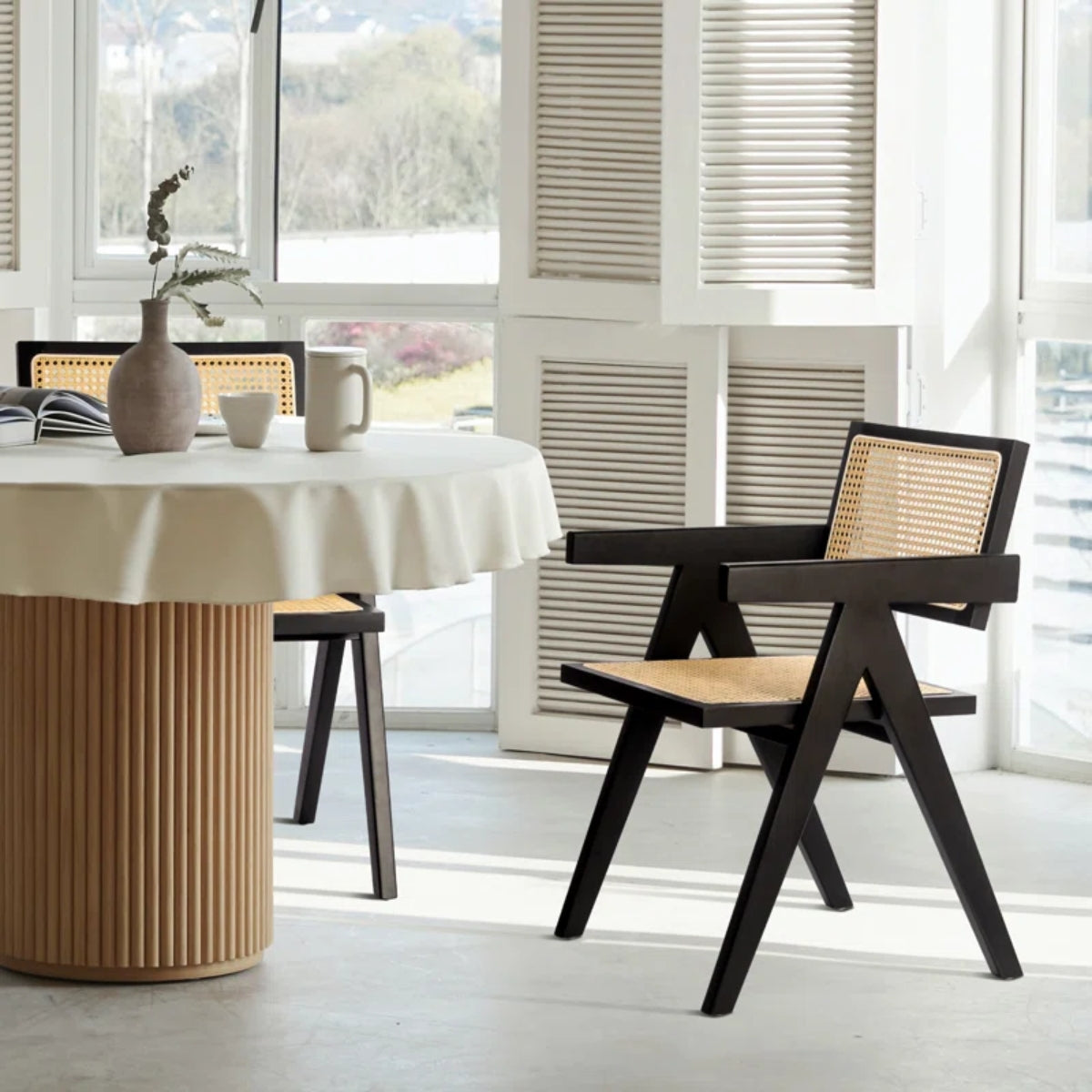 replica jeanneret armchair rattan and solid wood with table