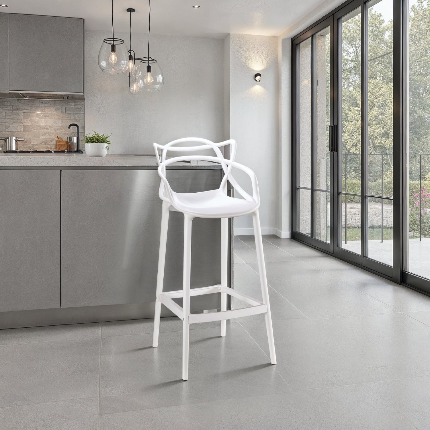 White Replica Masters Bar Stool in a modern kitchen setting.