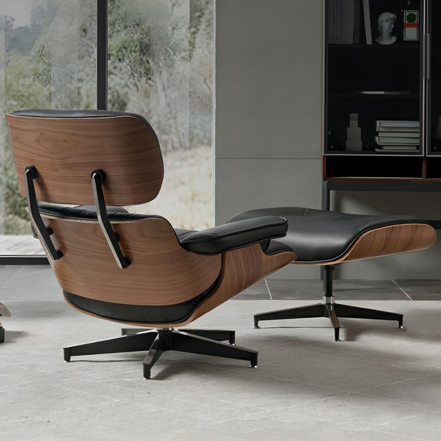 The Eames lounge chair and ottoman in a contemporary living room, showcasing the back design.
