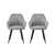 Two campbell grey velvet dining chairs with sleek black legs.
