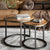 two-round-tables-with-metal-legs-and-wooden-tops-suitable-for-a-modern-or-industrialstyle-setting