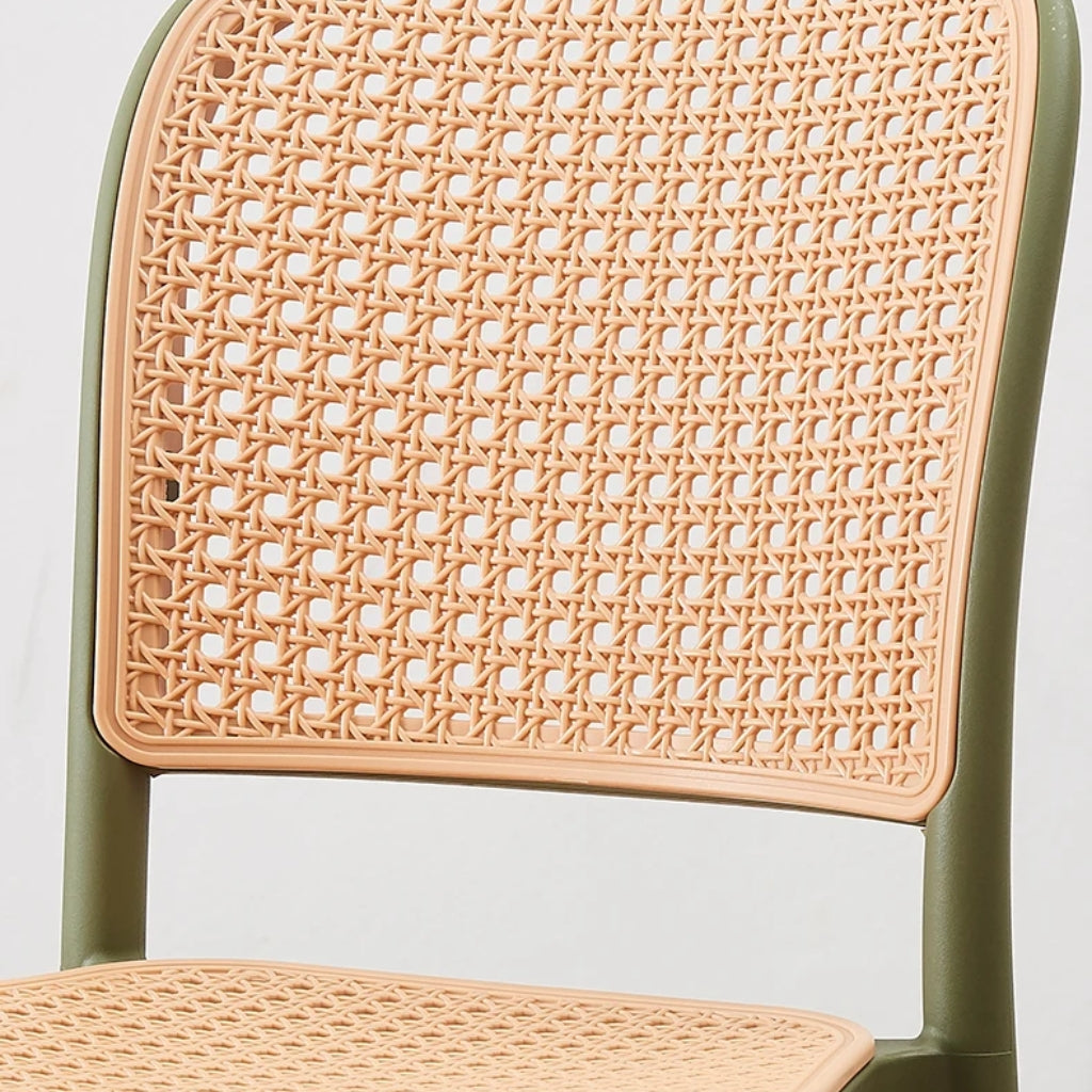 villa nova stackable rattan chairs close up.