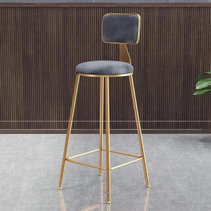 ivy kitchen stools lifestyle image in green with gold legs