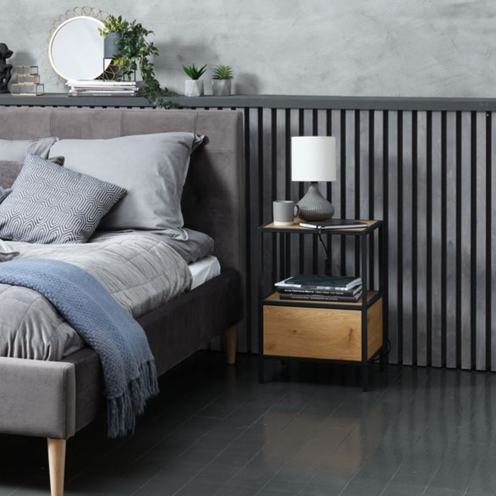 steelside bed nightstand next to bed with lamp