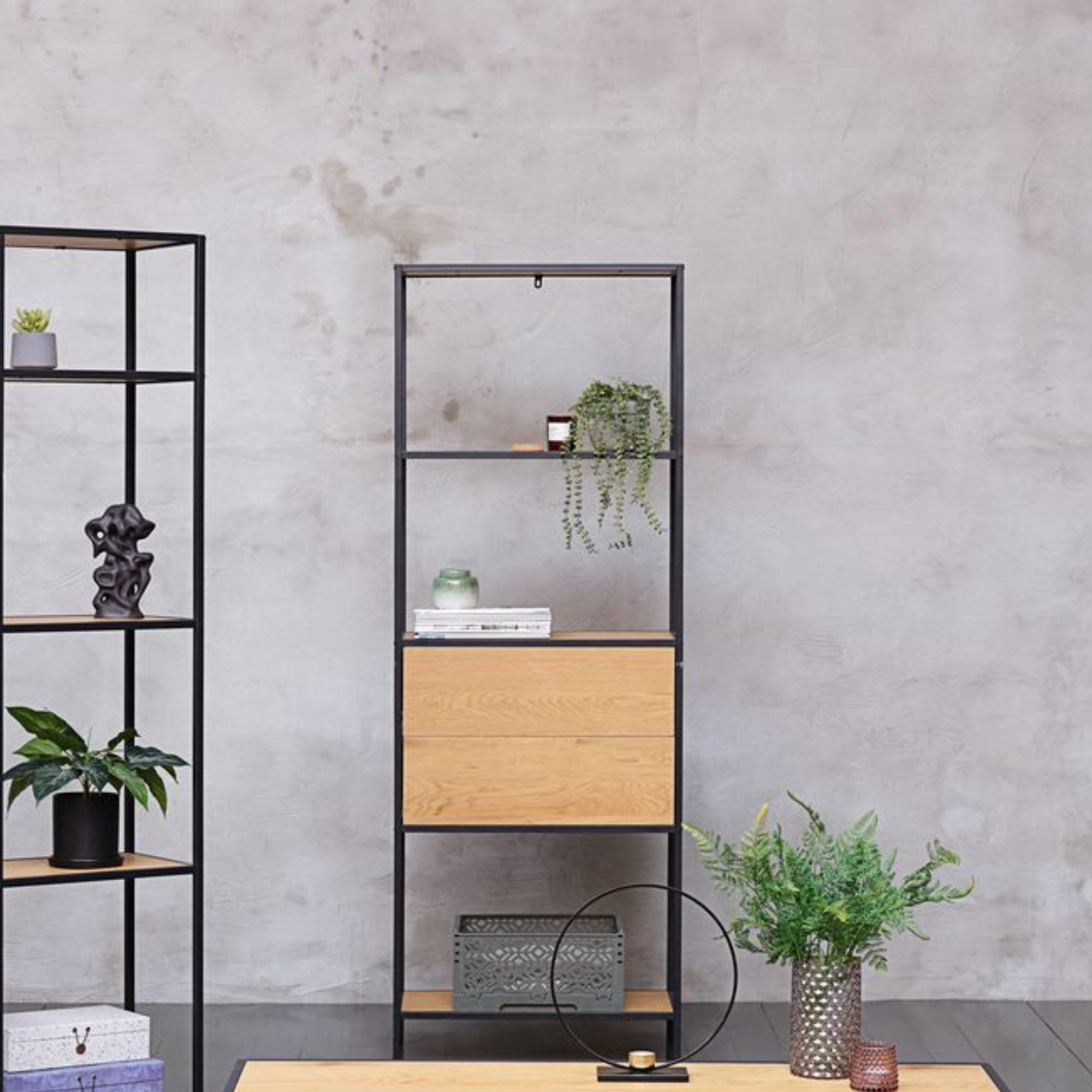 steelside tall storage bookcase with drawers against grey modern back drop